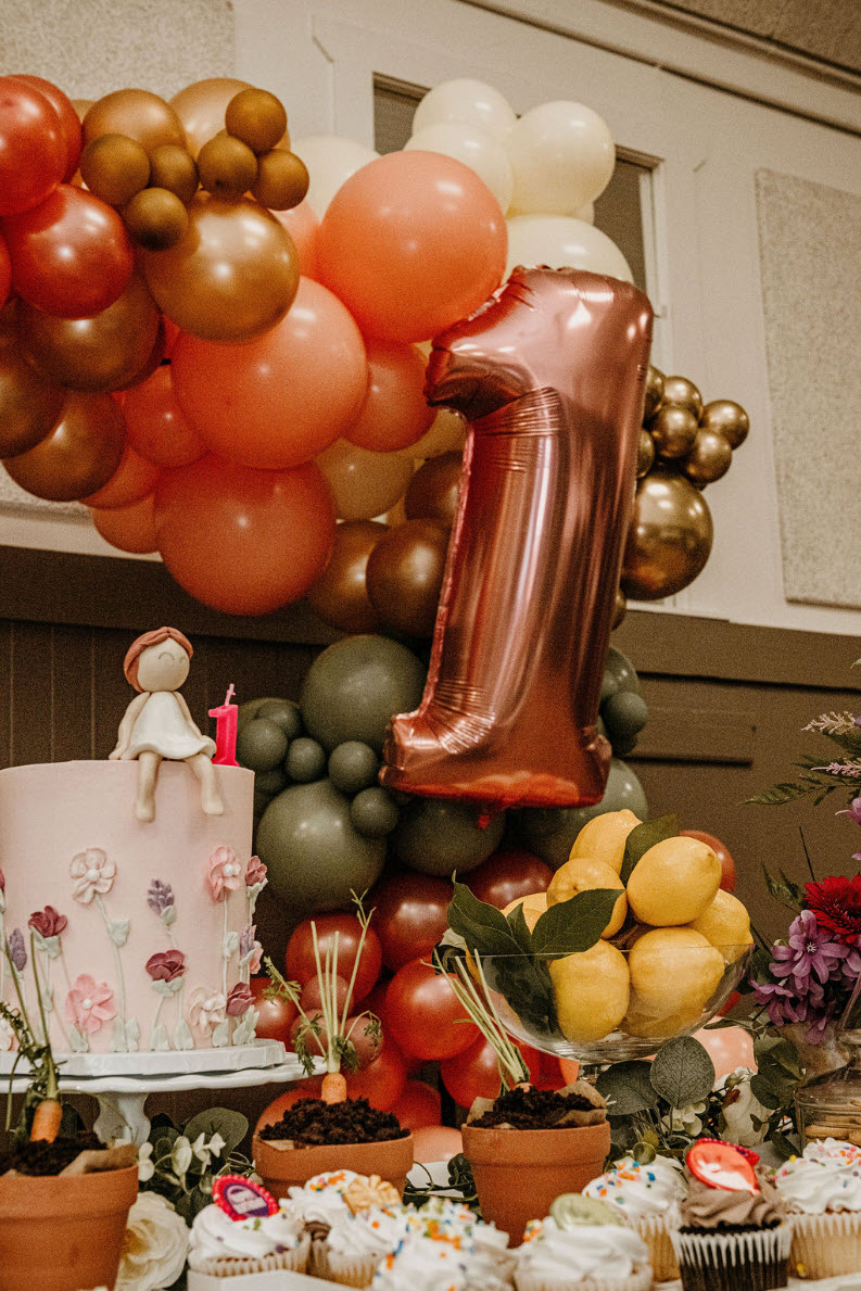 Floral first birthday dessert table